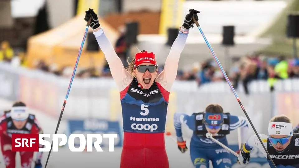Nadine Fähndrich feiert triumphierend mit erhobenen Armen und breitem Lächeln